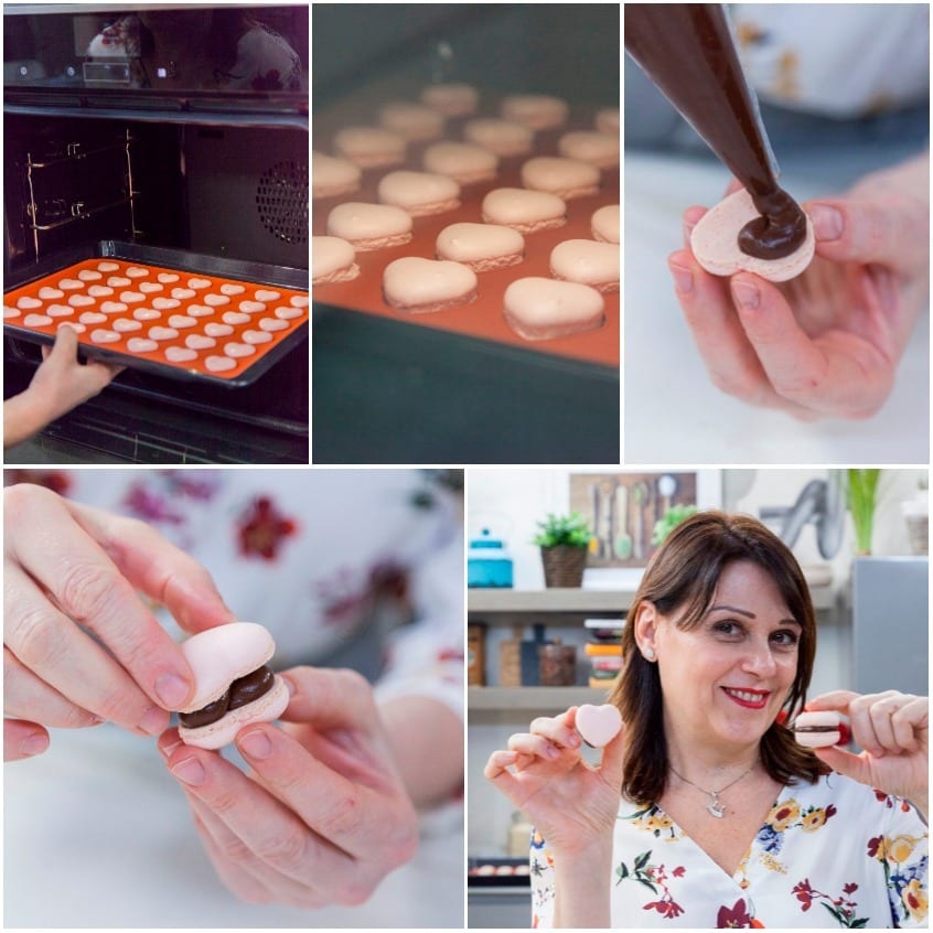 Macaron a cuore cotti, farciti con ganache al cioccolato e assemblati a sandwich