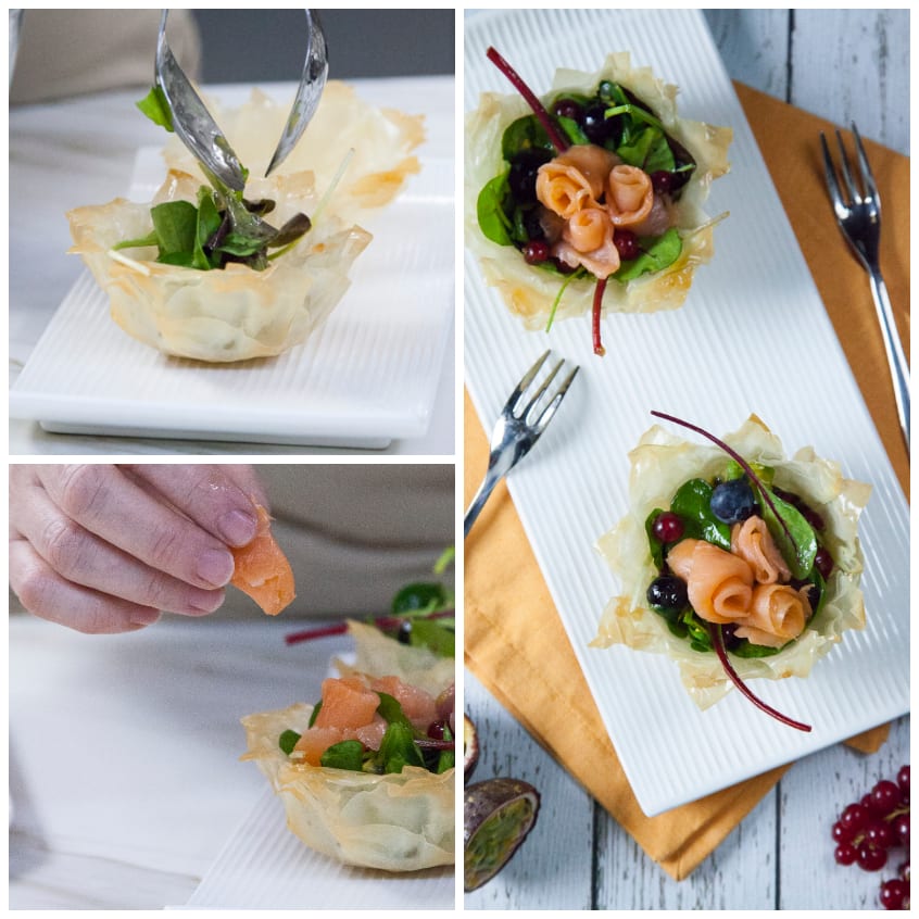 Cestini di pasta fillo riempiti con insalata, roselline di salmone affumicato e ribes