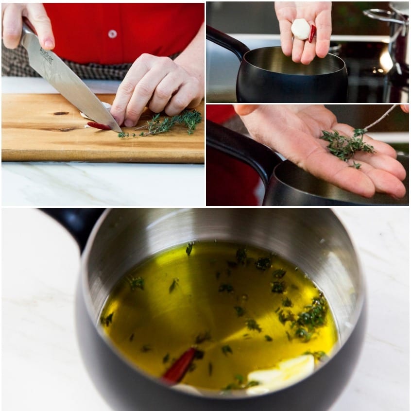 Olio extravergine in infusione con timo fresco, aglio e peperoncino in un pentolino