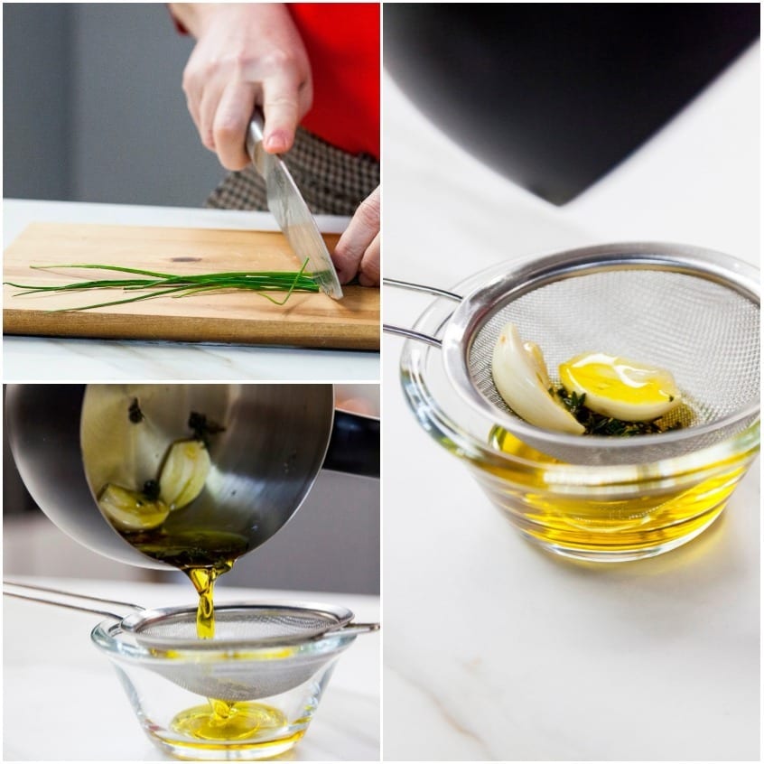 Erba cipollina tritata sul tagliere e olio aromatizzato con aglio filtrato in una ciotola