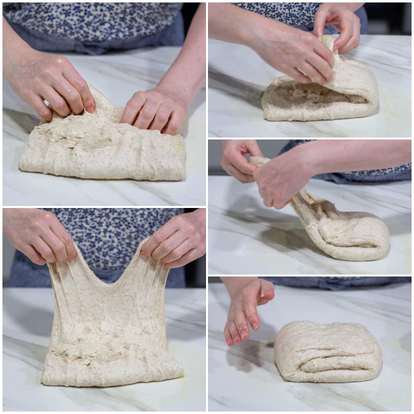Mani che stirano e ripiegano l'impasto della focaccia sul piano di lavoro