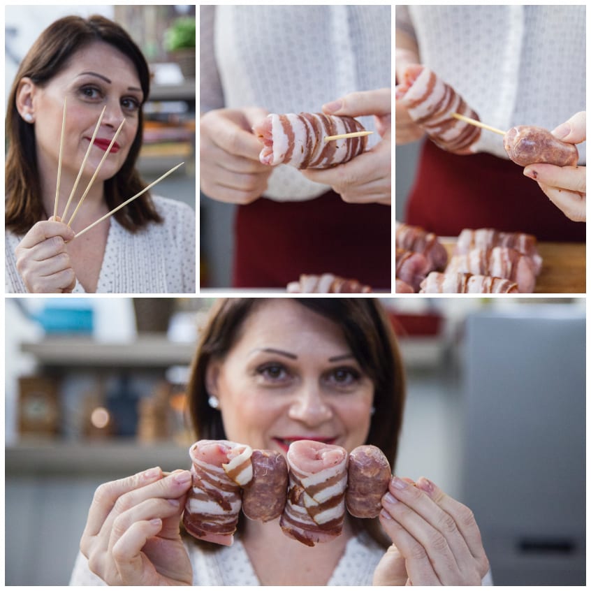 Mani che avvolgono fette di pancetta attorno agli involtini pronti per gli spiedini