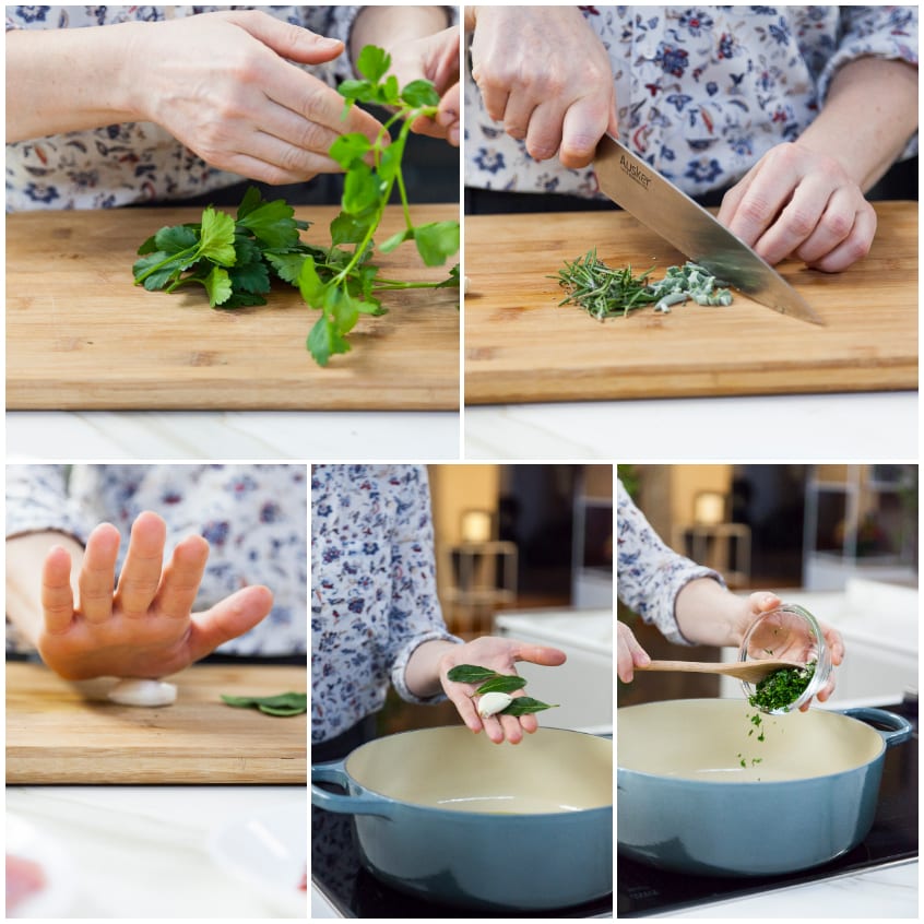 Erbe aromatiche tritate sul tagliere e aggiunte in pentola con aglio e alloro