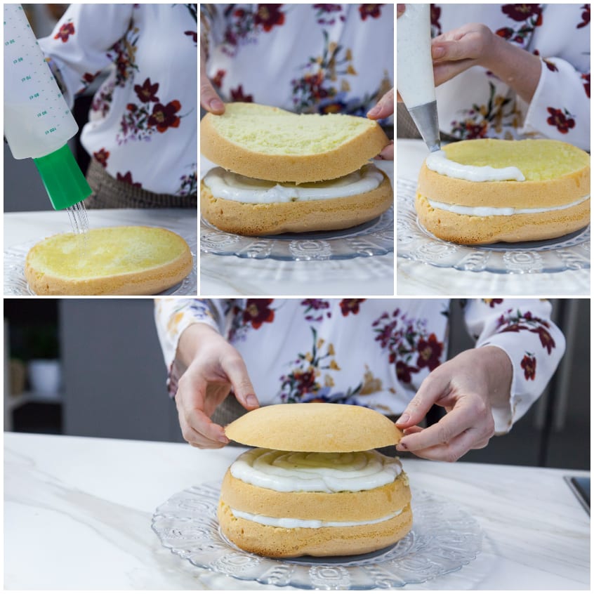 Mani che assemblano gli strati di pan di spagna farciti con crema bianca