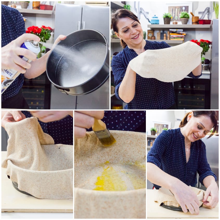 Sfoglia sottile adagiata e adattata ai bordi della teglia imburrata, pronta per la torta pasqualina