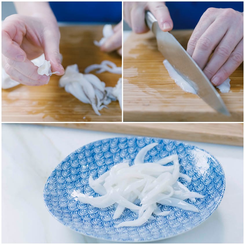 Seppie pulite tagliate a striscioline sottili sul tagliere, pronte per la cottura