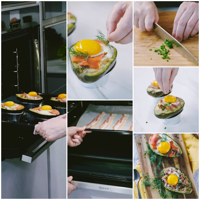 Avocado ripieni con uovo, salmone e aneto pronti da servire su tagliere