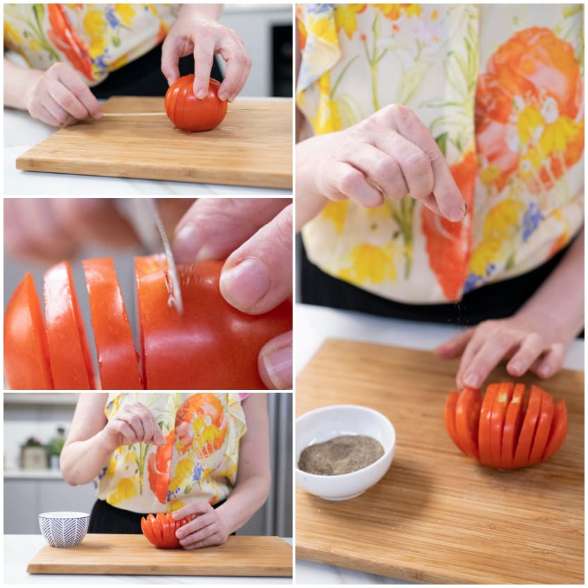 Pomodoro hasselback affettato a fisarmonica e condito con sale e pepe tra le fenditure