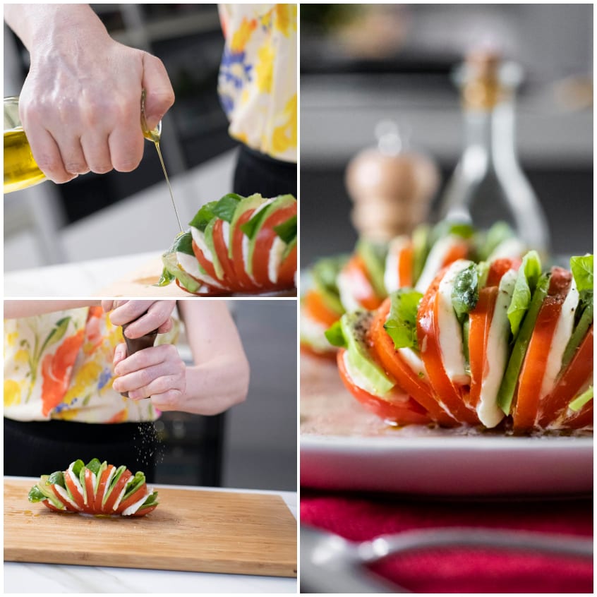 Olio extravergine versato a filo sui pomodori hasselback con mozzarella e basilico, poi macinata di pepe