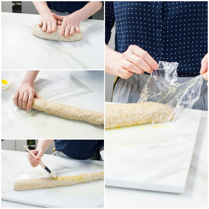Filoncino di impasto integrale modellato, spennellato con olio e avvolto nella pellicola per lievitare