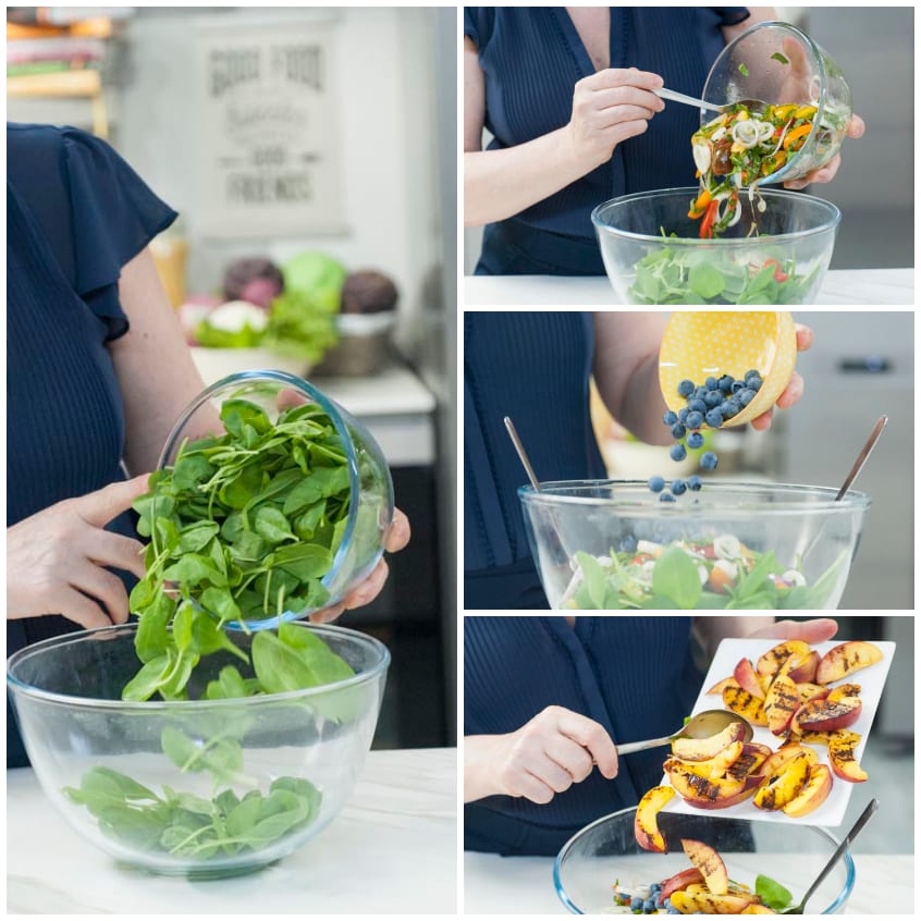 Composizione dell'insalata di pesche: spinacino, verdure condite, mirtilli e pesche grigliate aggiunti in sequenza