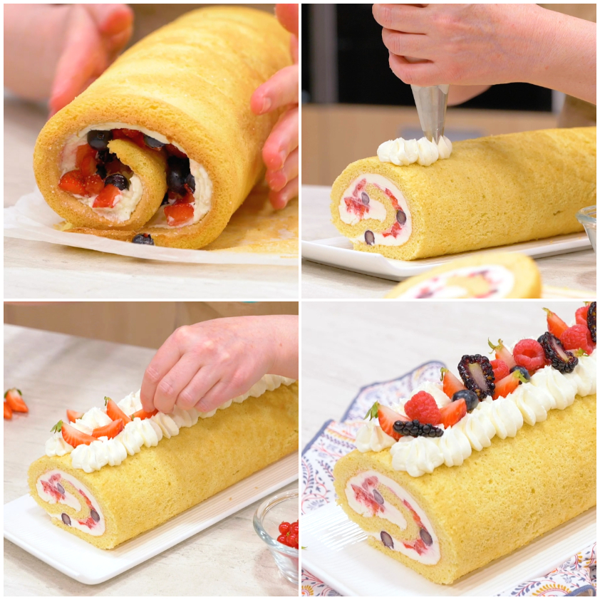 Rotolo alla panna decorato con ciuffi di panna montata e frutti di bosco freschi sulla superficie