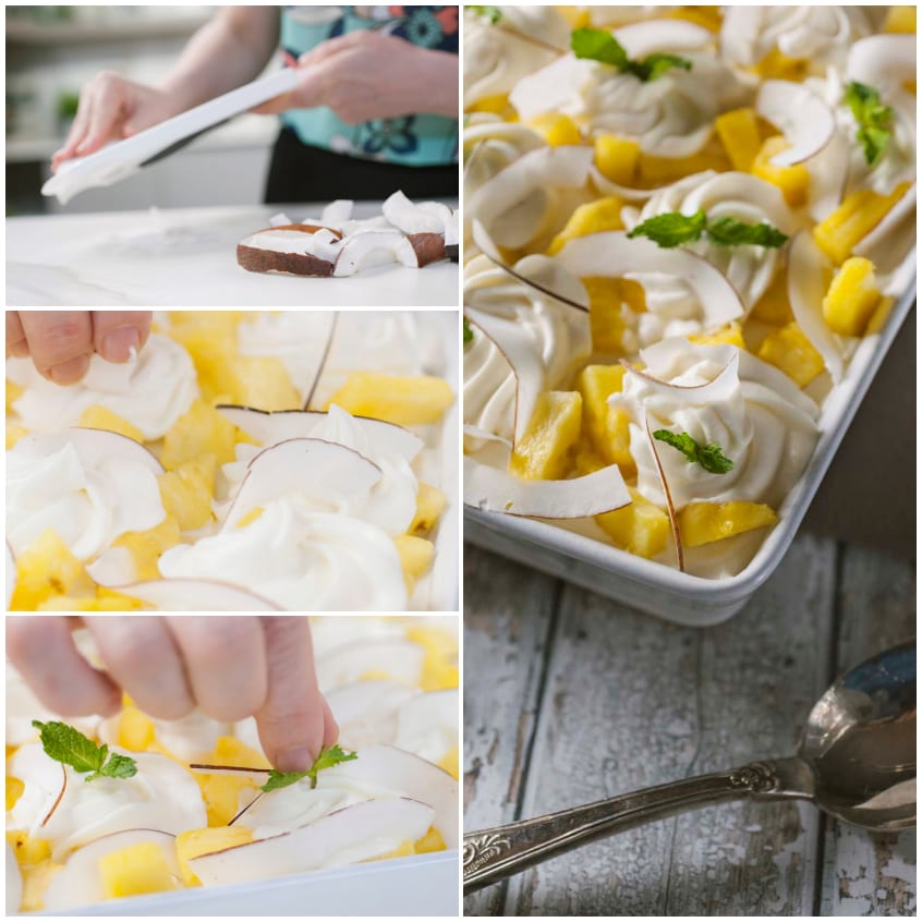 Mani che decorano il tiramisù all'ananas con scaglie di cocco e foglioline di menta