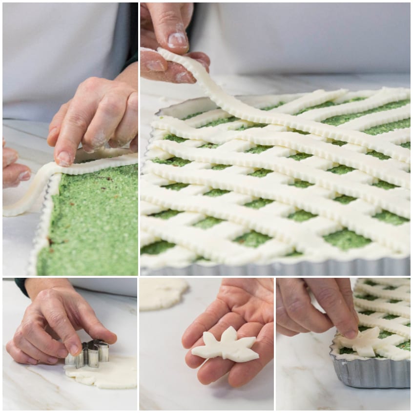 Mani che intrecciano strisce di pasta frolla a losanghe su un ripieno verde, con foglioline decorate sul bordo