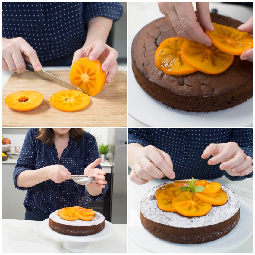 Fette di caco disposte sulla torta al cioccolato, poi spolverate di zucchero a velo e decorate con menta