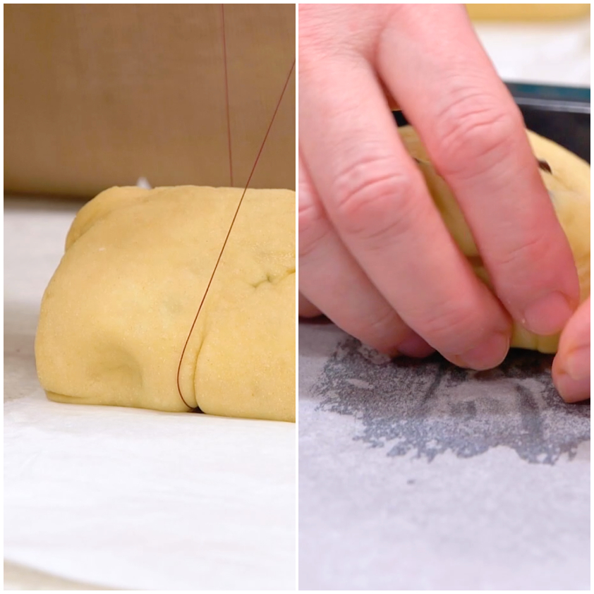 Rotolo di impasto tagliato con un filo e disco di girella posizionato su carta da forno