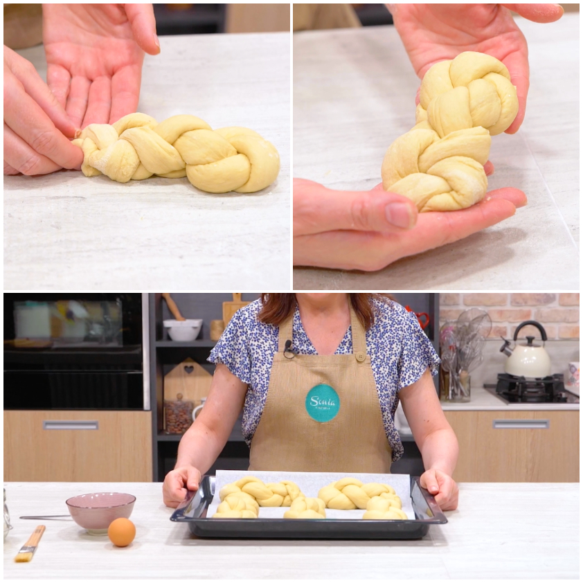 Treccine di pasta lievitata intrecciate a mano e disposte su teglia prima della lievitazione