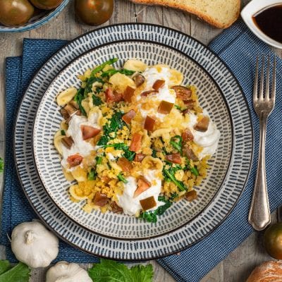Orecchiette con cime di rapa, burrata cremosa, pomodori a cubetti e granella di pane croccante