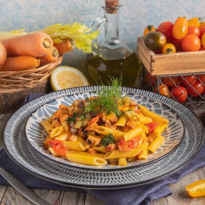 Penne al ragù di polpo con pomodorini, patate e ciuffo di finocchietto fresco
