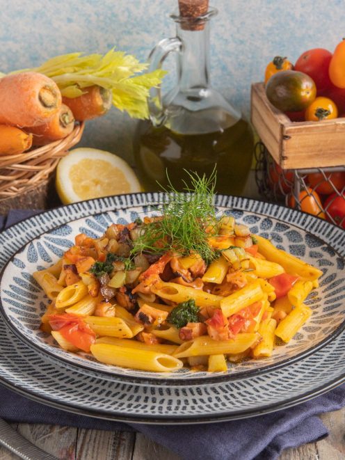 Penne al ragù di polpo con pomodorini, patate e ciuffo di finocchietto fresco