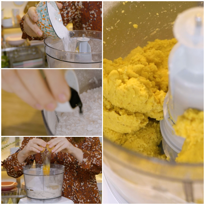 Impasto giallo e sabbioso che si compatta nel cutter dopo l'aggiunta di uova e zucchero a velo