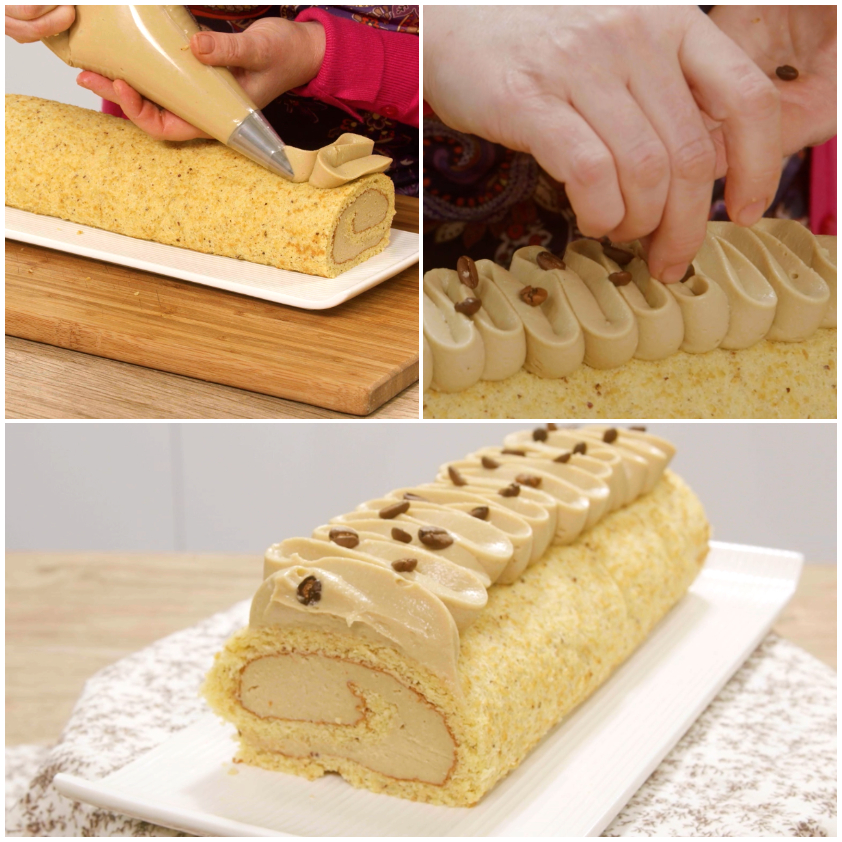 Rotolo al caffè decorato con onde di crema dalla sac à poche e chicchi di caffè