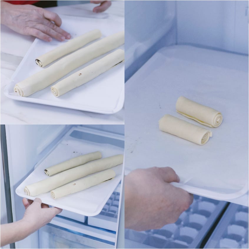 Rotoli di pasta arrotolati disposti su un vassoio, poi riposti in frigorifero