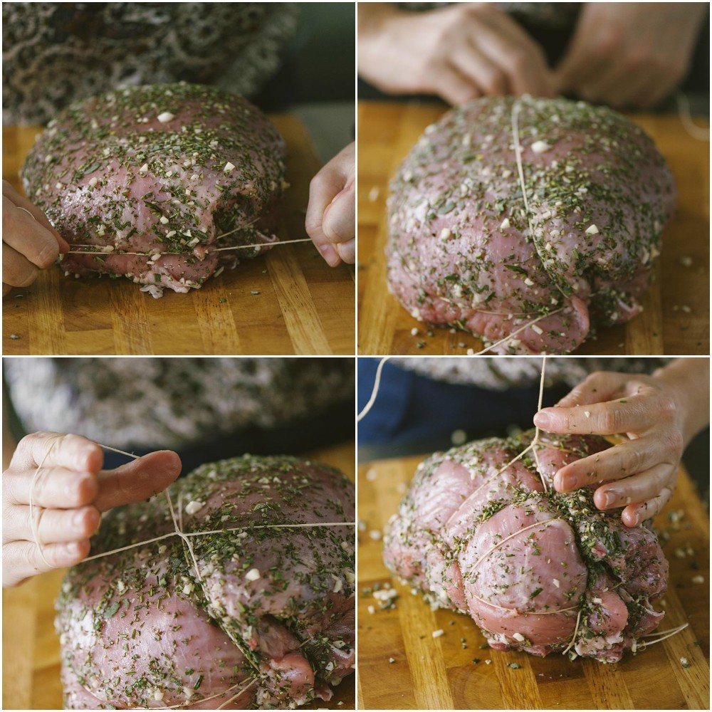 Arrosto di vitello alle erbe aromatiche e aglio legato con spago da cucina