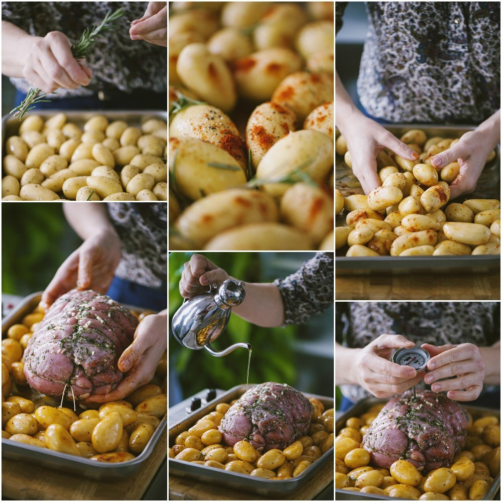 Mani che inseriscono un termometro da cucina nell'arrosto di vitello circondato da patate novelle