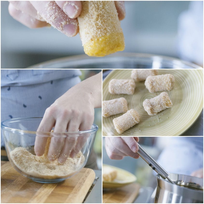 Involtini di pasta impanati e disposti su un piatto prima della frittura