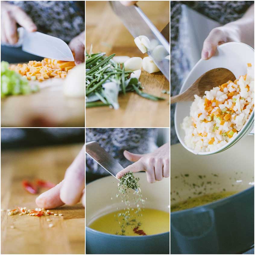 Preparazione del soffritto per pasta e fagioli: verdure tritate a coltello versate in pentola con olio e erbe aromatiche