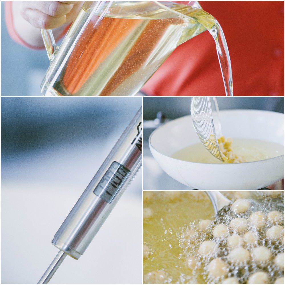 Struffoli che friggono in olio bollente, con impasto sbattuto a parte e olio versato da una caraffa