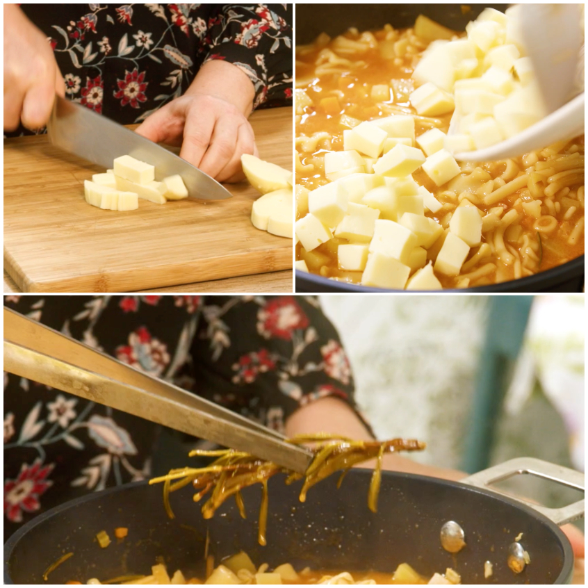 Cubetti di provola tagliati sul tagliere, poi aggiunti alla pasta e patate in cottura e mantecati