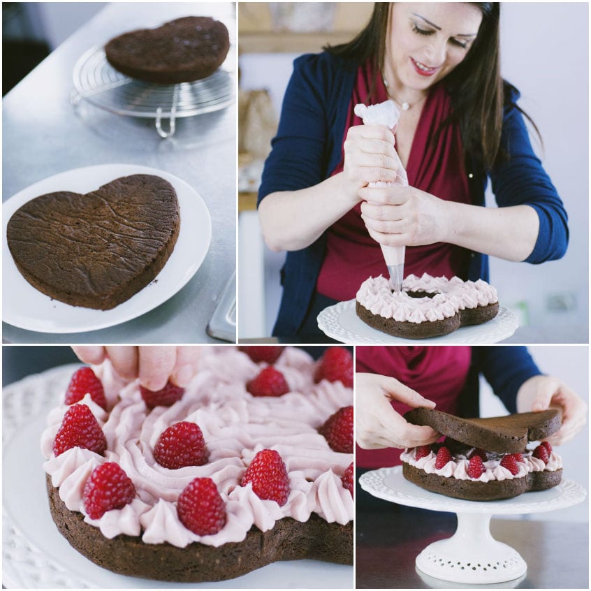 Farcitura con crema rosa e lamponi freschi tra due dischi di pan di spagna al cioccolato a forma di cuore
