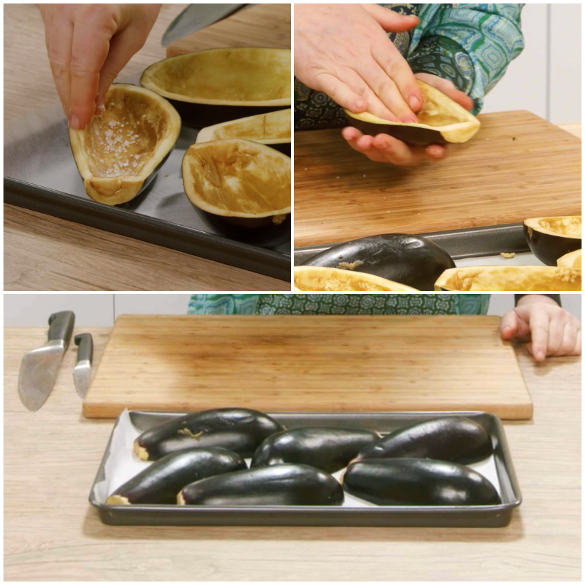 Melanzane tagliate a metà e salate disposte su teglia, pronte a spurgare