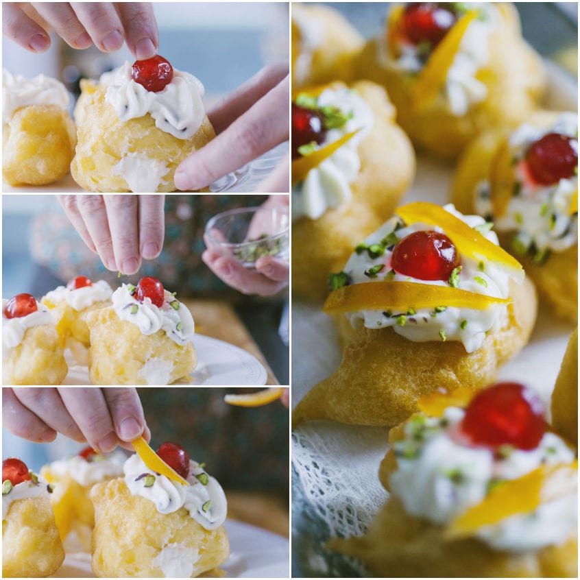 Sfinci di San Giuseppe guarniti con ciliegia candita, granella di pistacchio e scorzette d'arancia