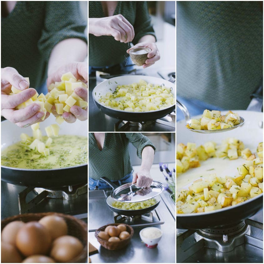 Cubetti di patate versati in padella, salati e rosolati fino a doratura