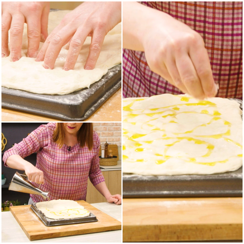 Mani che creano piccole conche con i polpastrelli sulla superficie della pizza bianca romana