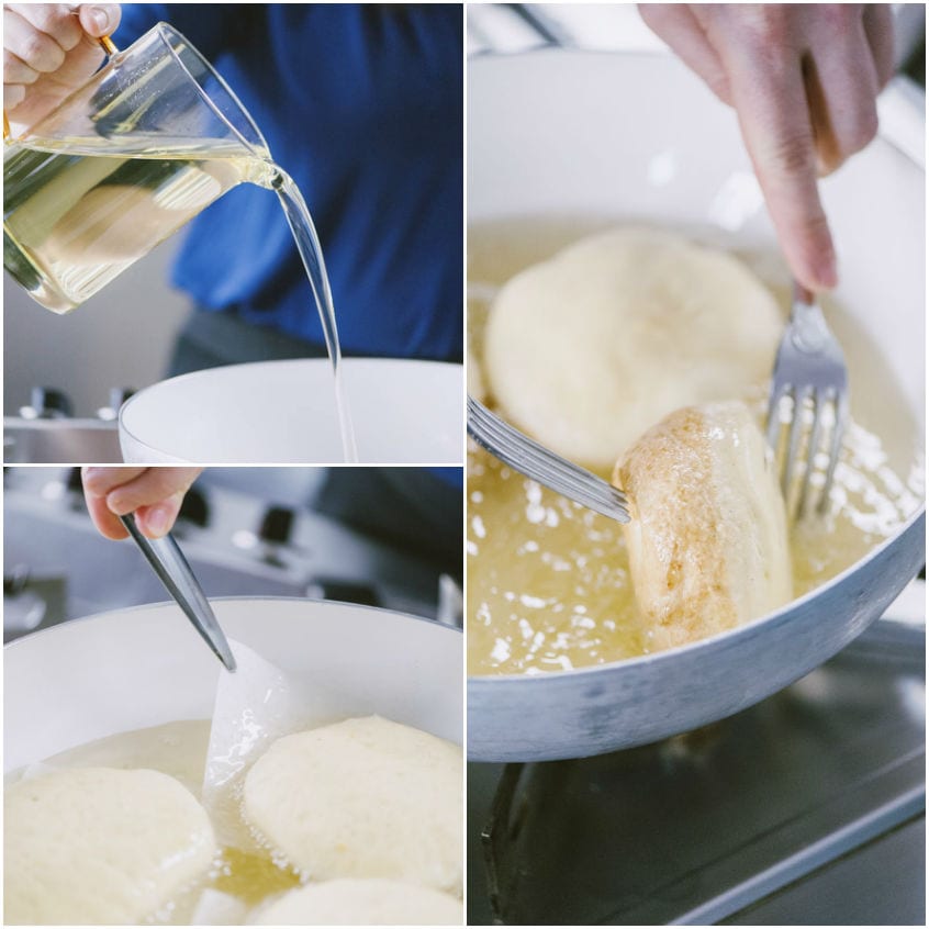 Bombe fritte immerse nell'olio bollente vengono girate con una forchetta fino a dorarsi