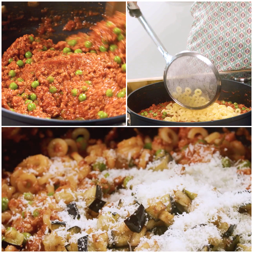 Anelletti scolati conditi con ragù, melanzane fritte a cubetti e pecorino grattugiato