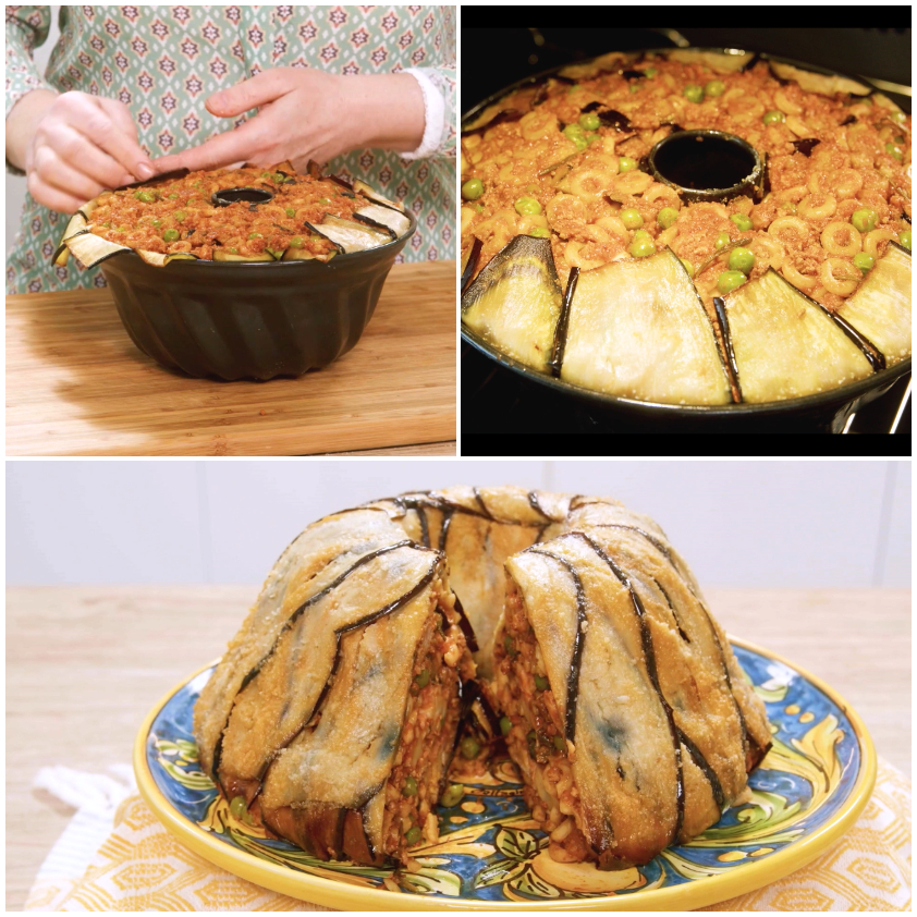 Timballo di anelletti sformato su piatto da portata con le melanzane ripiegate