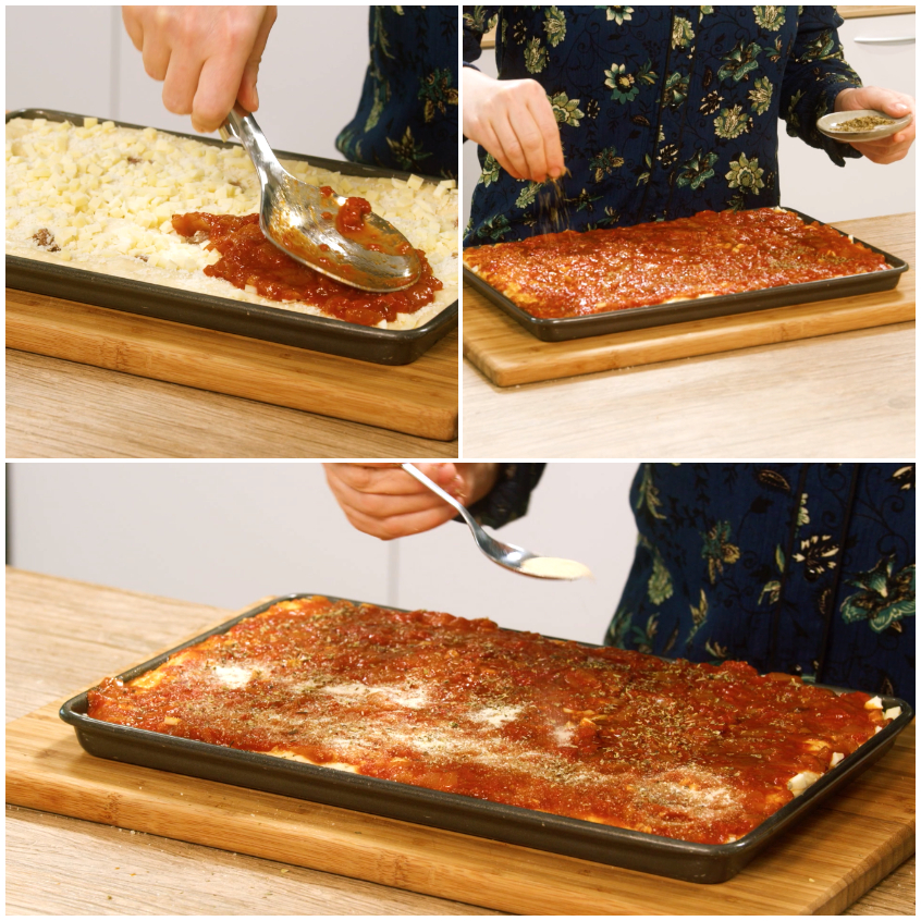 Stesura del sugo di pomodoro sullo sfincione crudo, poi origano e pangrattato cosparsi sulla teglia