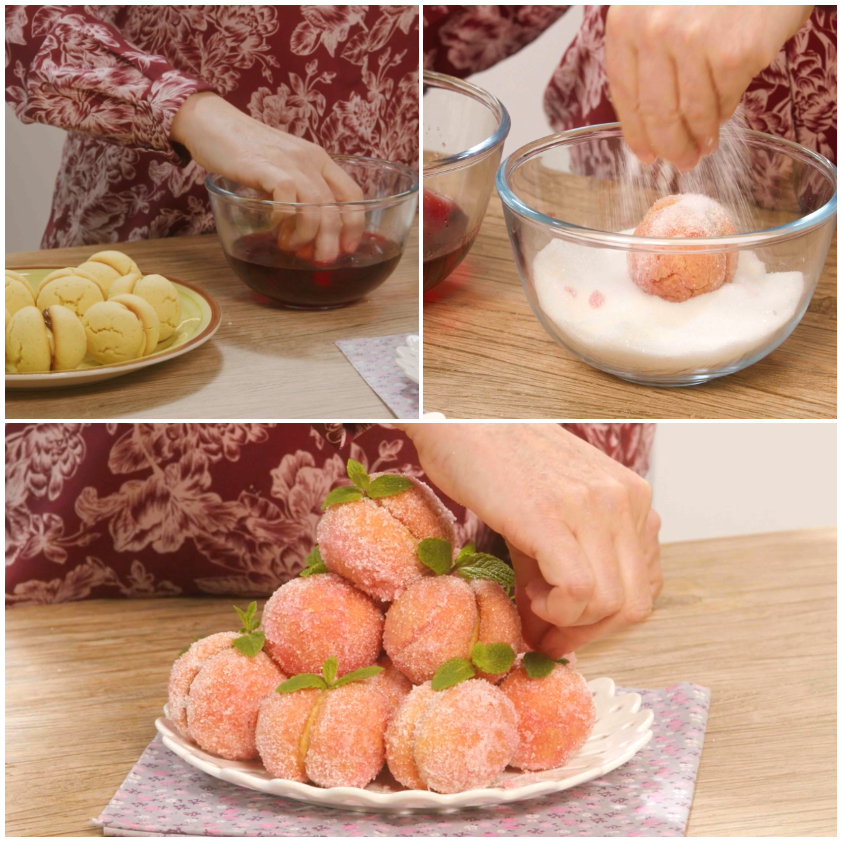 Finte pesche rosa passate nel liquore e rotolate nello zucchero, disposte a piramide con foglie di menta