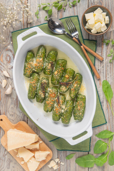 Rabaton al burro e salvia gratinati con parmigiano, serviti in teglia ovale