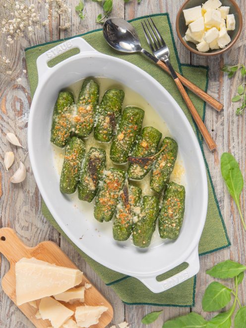 Rabaton al burro e salvia gratinati con parmigiano, serviti in teglia ovale
