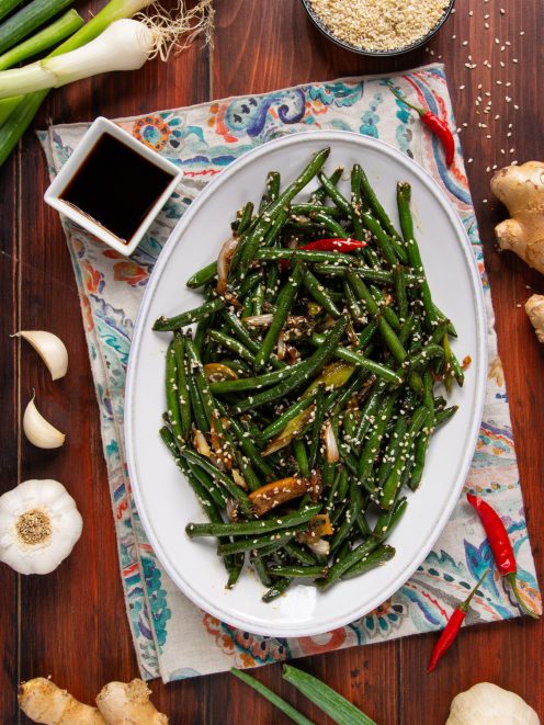 Fagiolini all'orientale saltati con cipollotti, peperoncino e semi di sesamo