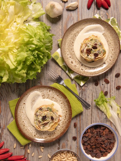 Rotolo di crespelle con scarola ricotta e provolone