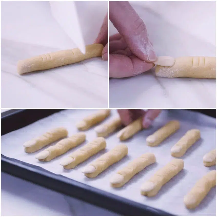 Bastoncini di frolla incisi con nocche e mandorla applicata a formare le dita della strega